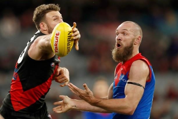 Cale Hooker of the Bombers and Max Gawn of the Demons compete during the round 15 AFL match between the Essendon Bombers and the Melbourne Demons at...
