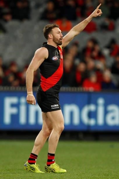 Cale Hooker of the Bombers celebrates a goal during the round 15 AFL match between the Essendon Bombers and the Melbourne Demons at Melbourne Cricket...