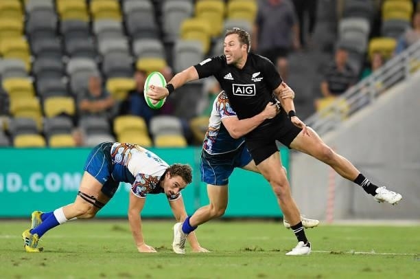 Tim Mikkelson of New Zealand gets a pass away during the Oceania Sevens Challenge match between New Zealand and Oceania at Queensland Country Bank...