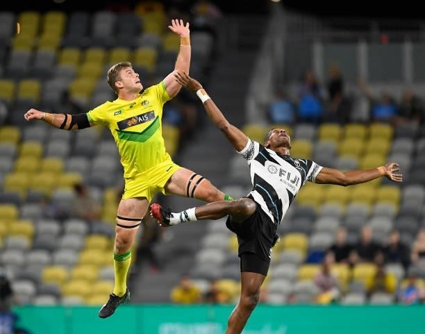 Nick Malouf of Australia and Josefa Talacolo of Fiji contest the ball during the Oceania Sevens Challenge match between Fiji and Australia at...
