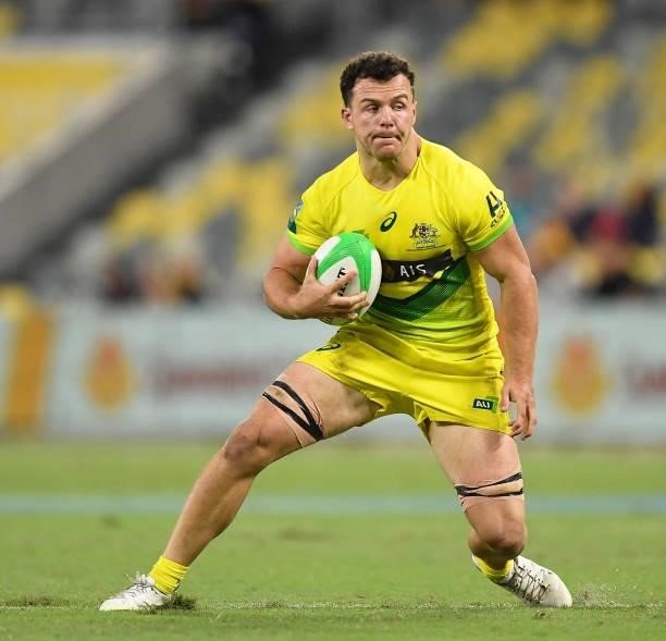Dylan Pietsch of Australia runs the ball during the Oceania Sevens Challenge match between Fiji and Australia at Queensland Country Bank Stadium on...