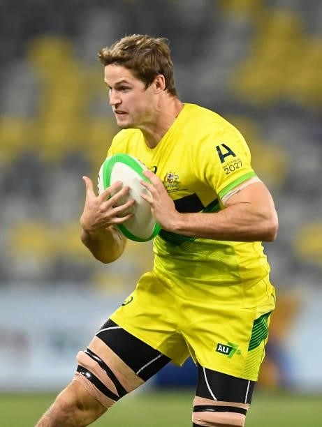 Tim Anstee of Australia runs the ball during the Oceania Sevens Challenge match between Fiji and Australia at Queensland Country Bank Stadium on June...