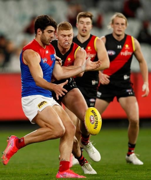 Christian Petracca of the Demons kicks the ball during the round 15 AFL match between the Essendon Bombers and the Melbourne Demons at Melbourne...