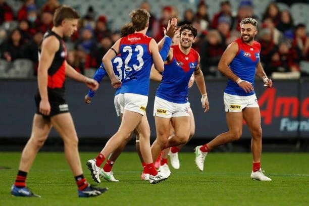 Christian Petracca of the Demons celebrates a goal during the round 15 AFL match between the Essendon Bombers and the Melbourne Demons at Melbourne...
