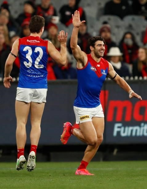Christian Petracca of the Demons celebrates a goal during the round 15 AFL match between the Essendon Bombers and the Melbourne Demons at Melbourne...