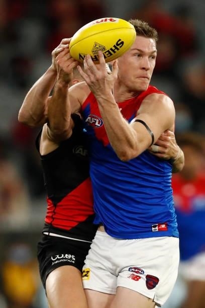Tom McDonald of the Demons gathers the ball during the round 15 AFL match between the Essendon Bombers and the Melbourne Demons at Melbourne Cricket...