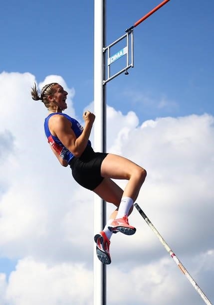 Holly Bradshaw of Blackburn celebrates after setting the new national record during the Womens Pole Vault Final on Day Two of the Muller British...