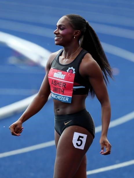 Dina Asher-Smith of Blackheath smiles after winning the Womens 100m Semi Final Heat 3 on Day Two of the Muller British Athletics Championships at...