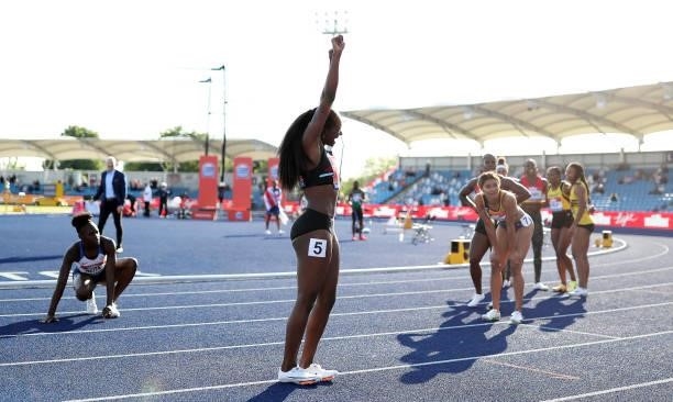 Dina Asher-Smith of Blackheath celebrates winning the Womens 100m Final during Day Two of the Muller British Athletics Championships at Manchester...