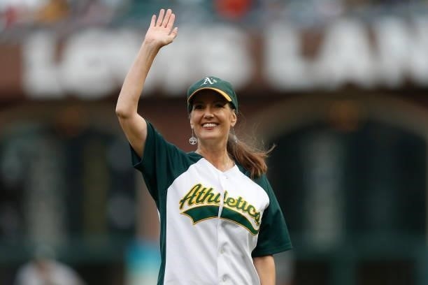 Mayor of Oakland Libby Schaaf throws out the ceremonial first pitch before the game between the San Francisco Giants and the Oakland Athletics at...
