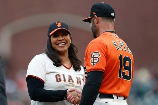 Mayor of San Francisco London Breed shakes hands with Gabe Kapler manager of the San Francisco Giants after throwing out the ceremonial first pitch...