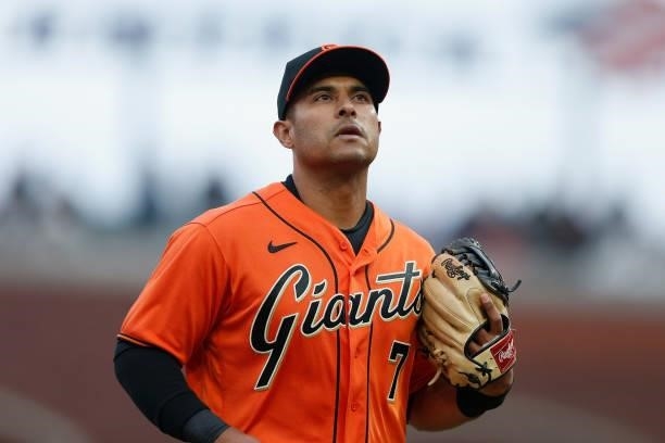 Donovan Solano of the San Francisco Giants jogs to the dugout between innings against the Oakland Athletics at Oracle Park on June 25, 2021 in San...