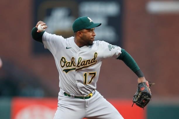 Elvis Andrus of the Oakland Athletics fields the ball against the San Francisco Giants at Oracle Park on June 25, 2021 in San Francisco, California.