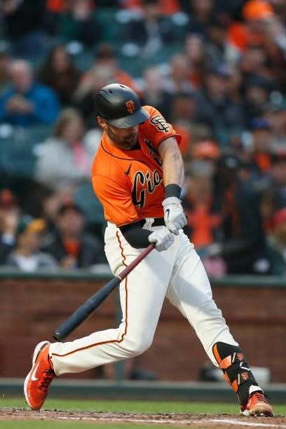 Curt Casali of the San Francisco Giants at bat against the Oakland Athletics at Oracle Park on June 25, 2021 in San Francisco, California.