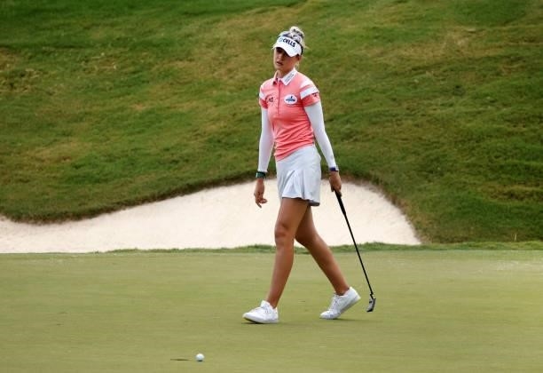 Nelly Korda reacts to her missed putt on the 18th green during the third round of the KPMG Women's PGA Championship at Atlanta Athletic Club on June...
