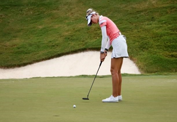 Nelly Korda putts on the 18th green during the third round of the KPMG Women's PGA Championship at Atlanta Athletic Club on June 26, 2021 in Johns...