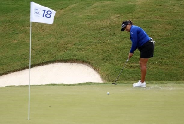 Lizette Salas putts on the 18th green during the third round of the KPMG Women's PGA Championship at Atlanta Athletic Club on June 26, 2021 in Johns...
