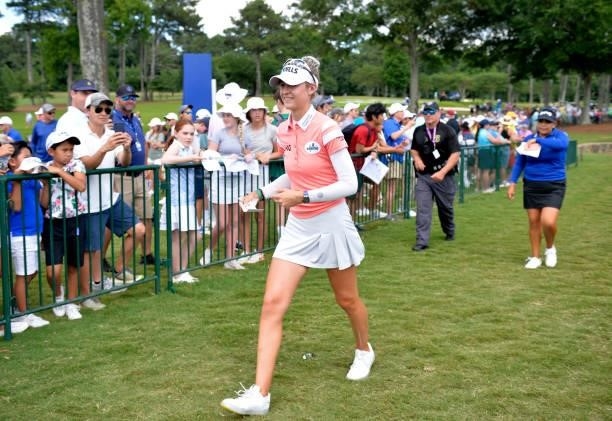 Nelly Korda walks off of the18th green after her round during the third round of the KPMG Women's PGA Championship at Atlanta Athletic Club on June...