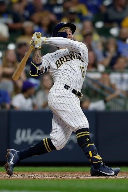 Kolten Wong of the Milwaukee Brewers watches a long fly ball go foul against the Colorado Rockies at American Family Field on June 25, 2021 in...