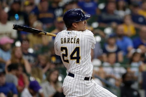 Avisail Garcia of the Milwaukee Brewers swings at a pitch against the Colorado Rockies at American Family Field on June 25, 2021 in Milwaukee,...