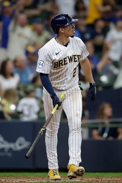 Willy Adames of the Milwaukee Brewers hits a two run homer in the ninth inning to tie the game against the Colorado Rockies at American Family Field...