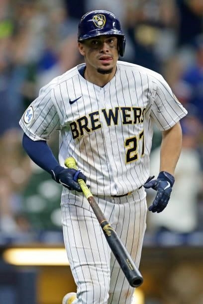 Willy Adames of the Milwaukee Brewers hits a two run homer in the ninth inning to tie the game against the Colorado Rockies at American Family Field...