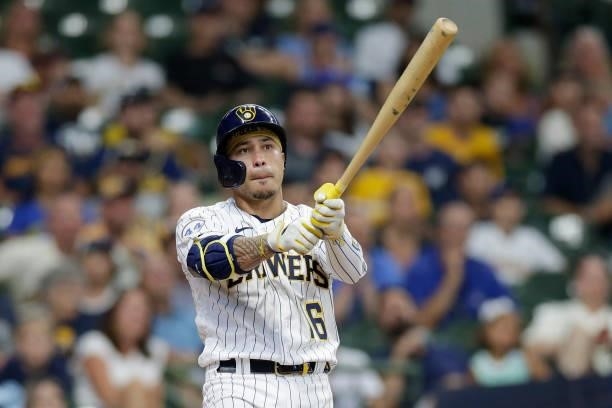 Kolten Wong of the Milwaukee Brewers swings at a pitch against the Colorado Rockies at American Family Field on June 25, 2021 in Milwaukee,...