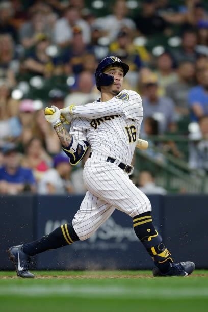 Kolten Wong of the Milwaukee Brewers swings at a pitch against the Colorado Rockies at American Family Field on June 25, 2021 in Milwaukee,...