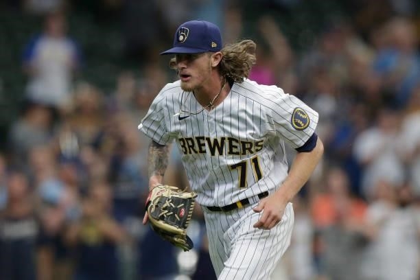 Josh Hader of the Milwaukee Brewers runs off the field after the striking out a batter against the Colorado Rockies at American Family Field on June...