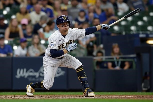 Luis Urias of the Milwaukee Brewers swings at a pitch against the Colorado Rockies at American Family Field on June 25, 2021 in Milwaukee, Wisconsin....