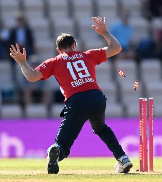 Chris Woakes of England reacts as a direct throw from Sam Billings runs out Dasun Shanaka of Sri Lanka during the third T20 International between...