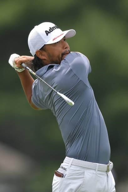 Satoshi Kodaira of Japan plays his shot from the fifth tee during the third round of the Travelers Championship at TPC River Highlands on June 26,...