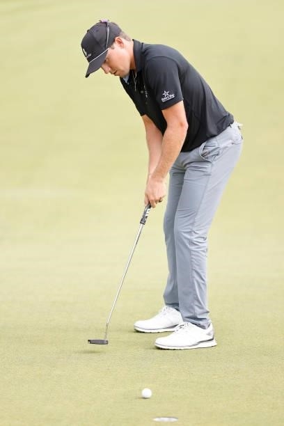 Kramer Hickok of the United States putts on the 15th green during the third round of the Travelers Championship at TPC River Highlands on June 26,...