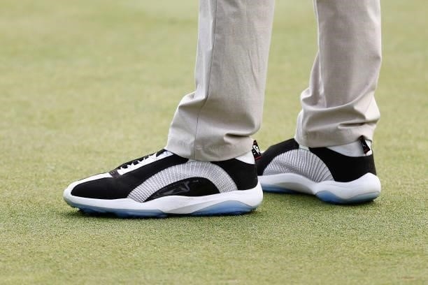 Detail of Bubba Watson of the United States shoes on the 18th green during the third round of the Travelers Championship at TPC River Highlands on...