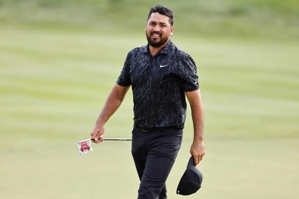 Jason Day of Australia reacts on the 18th green during the third round of the Travelers Championship at TPC River Highlands on June 26, 2021 in...