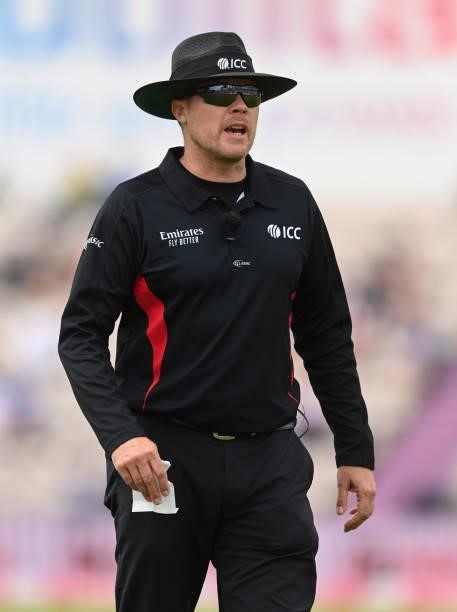 Umpire Martin Saggers prepares to clean the ball during the third T20 International between England and Sri Lanka at the Ageas Bowl on June 26, 2021...