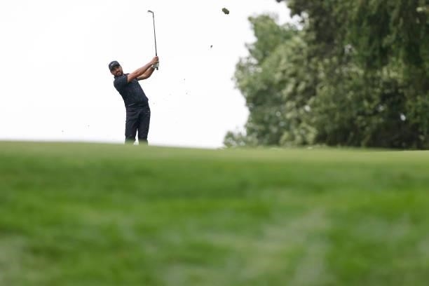 Jason Day of Australia plays a shot on the 14th hole during the third round of the Travelers Championship at TPC River Highlands on June 26, 2021 in...