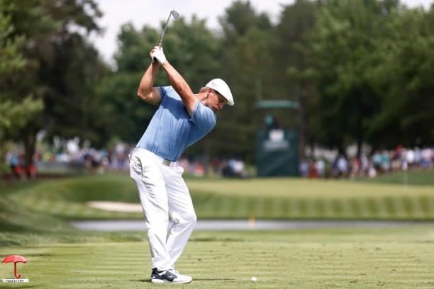 Bryson DeChambeau of the United States plays his shot from the eighth tee during the third round of the Travelers Championship at TPC River Highlands...
