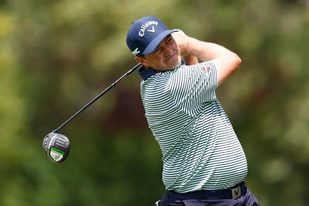 Brian Stuard of the United States plays his shot from the sixth tee during the third round of the Travelers Championship at TPC River Highlands on...