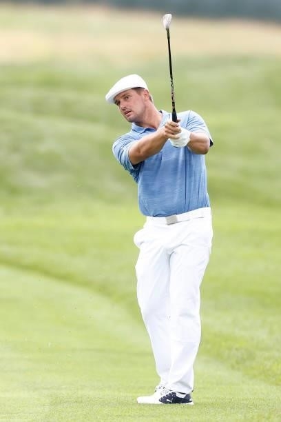 Bryson DeChambeau of the United States plays a shot on the seventh hole during the third round of the Travelers Championship at TPC River Highlands...