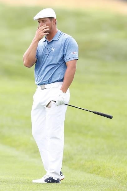 Bryson DeChambeau of the United States reacts to his shot on the seventh hole during the third round of the Travelers Championship at TPC River...