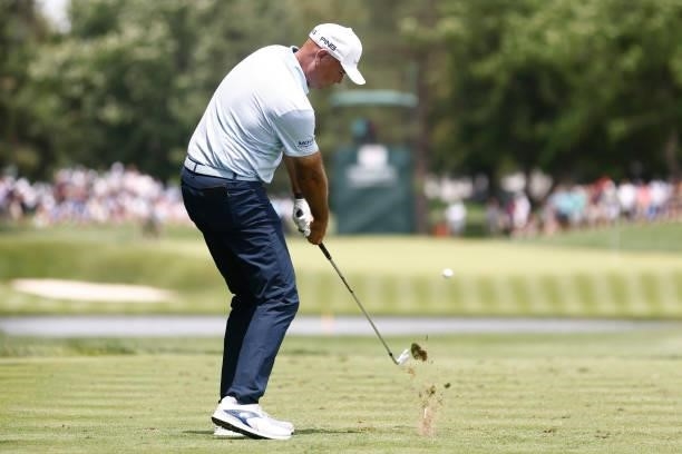 Stewart Cink of the United States plays his shot from the eighth tee during the third round of the Travelers Championship at TPC River Highlands on...