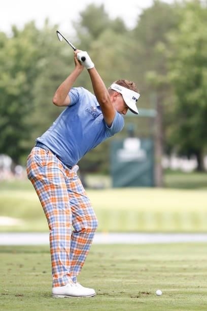 Ian Poulter of England plays his shot from the eighth tee during the third round of the Travelers Championship at TPC River Highlands on June 26,...