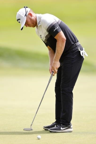 Talor Gooch of the United States putts on the seventh green during the third round of the Travelers Championship at TPC River Highlands on June 26,...