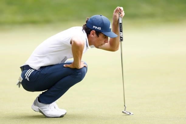 Joaquin Niemann of Chile looks over a putt on the seventh green during the third round of the Travelers Championship at TPC River Highlands on June...