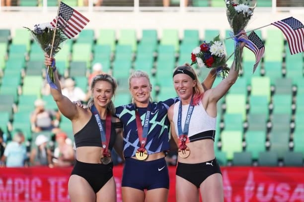 Katie Nageotte , first, Morgann LeLeux , second, and Sandi Morris, third, celebrate on the podium after the Women's Pole Vault Final on day nine of...