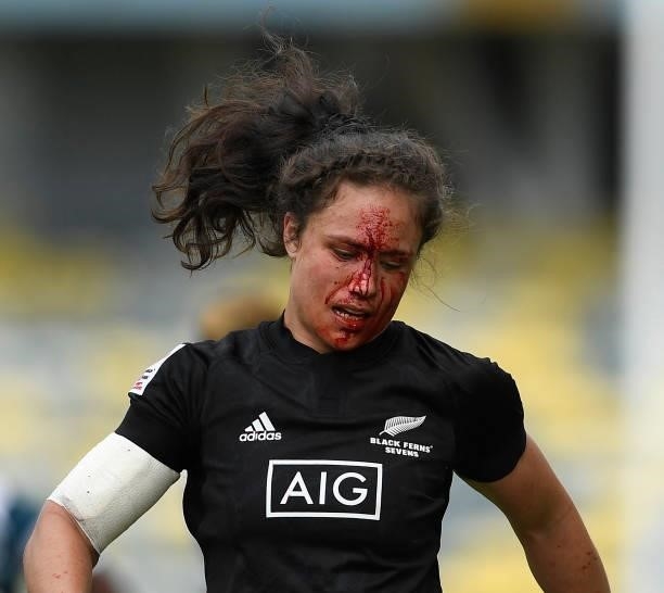 Ruby Tui of New Zealand bleeds from a head wound during the Oceania Sevens Challenge match between New Zealand and Fiji at Queensland Country Bank...