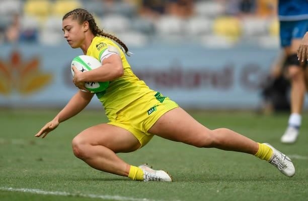 Alysia Lefau-Fakaosilea of Australia scores a try during the Oceania Sevens Challenge match between Australia and Oceania at Queensland Country Bank...