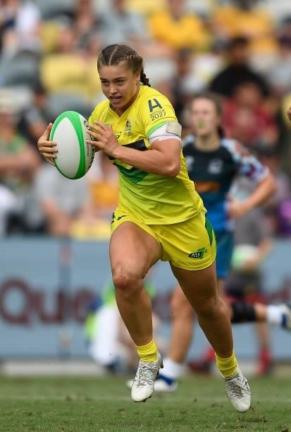 Alysia Lefau-Fakaosilea of Australia runs to score a try during the Oceania Sevens Challenge match between Australia and Oceania at Queensland...