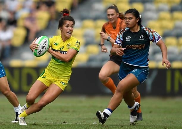 Madison Higgins-Ashby of Australia runs the ball during the Oceania Sevens Challenge match between Australia and Oceania at Queensland Country Bank...